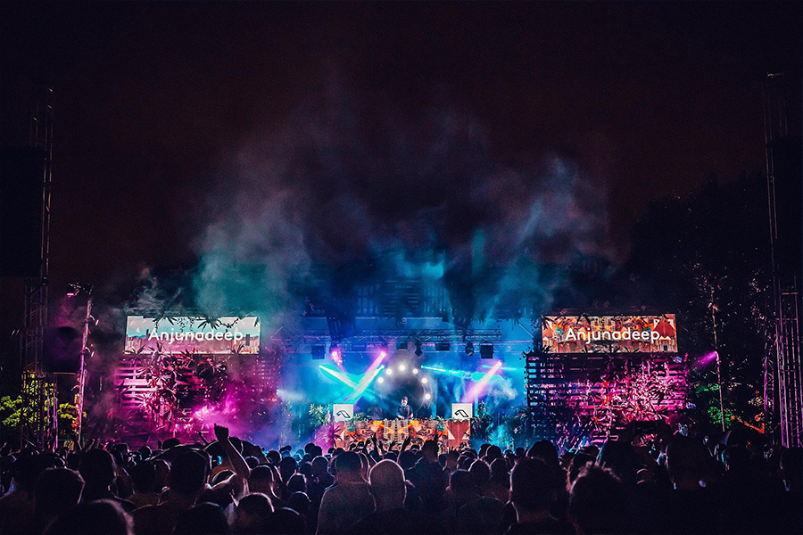 Festival stage at night with blue and pink lights, taken at Anjunadeep festival in London