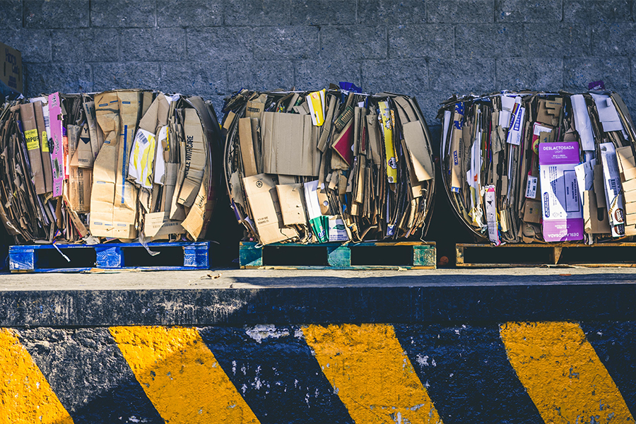 Cardboard stacked into piles for recycling